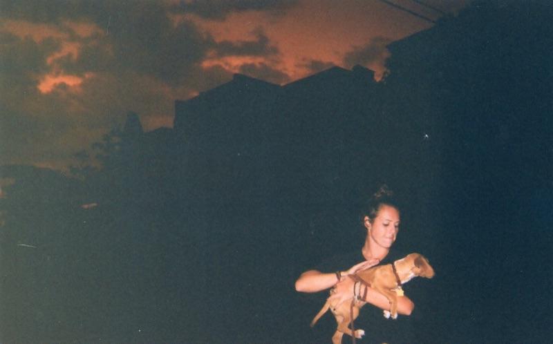 Disposable photo: Lauren picking up Macey during Summer Lightning Storm